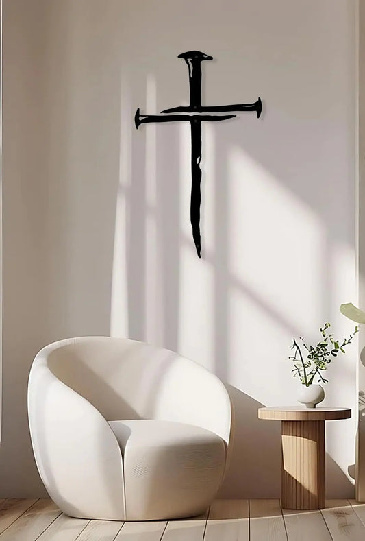 The modern interior features a white chair, a wooden side table, and a wall-mounted black sculpture.